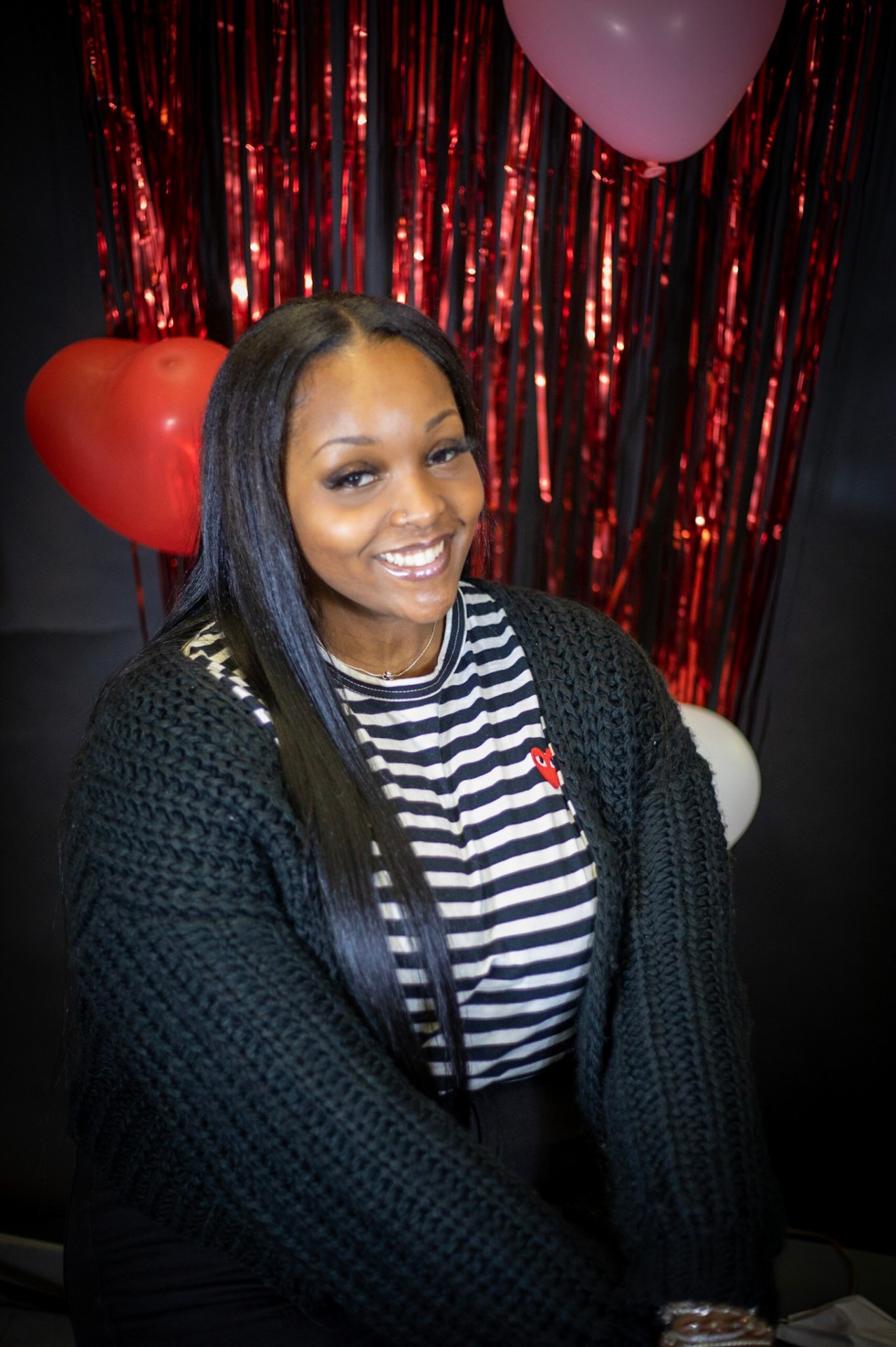 Valentine's portrait with red fringe backdrop