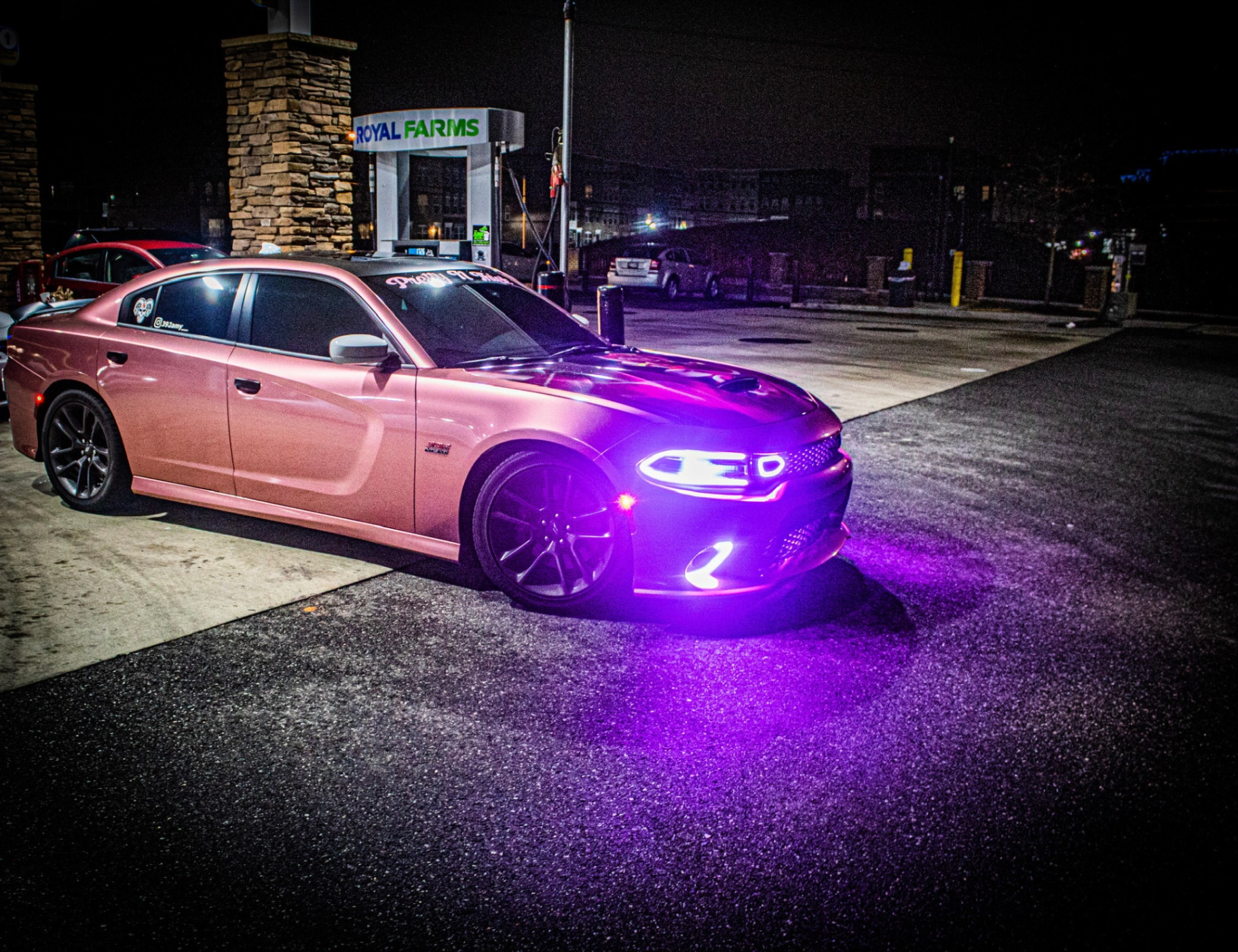 Charger with purple underglow at the pump